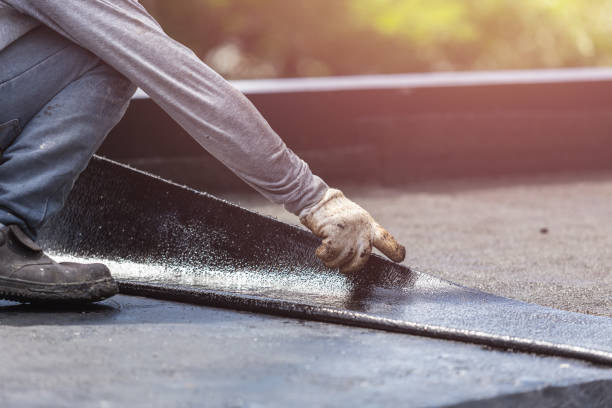 Professional Basement Waterproofing technician working in Hewlett, NY